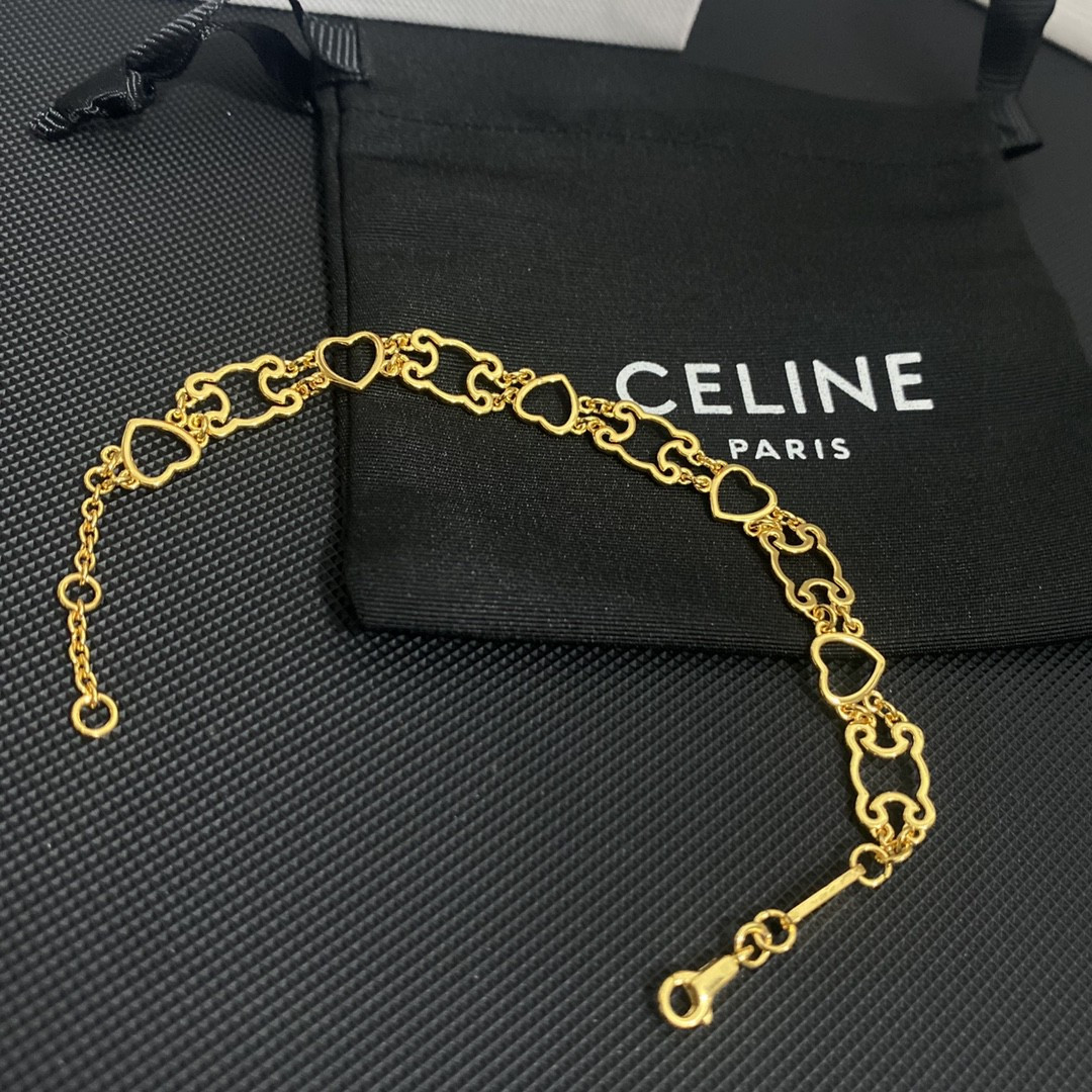 Vòng Tay Celine Siêu Cấp Phối Logo Kim Loại Vàng Hình Trái Tim