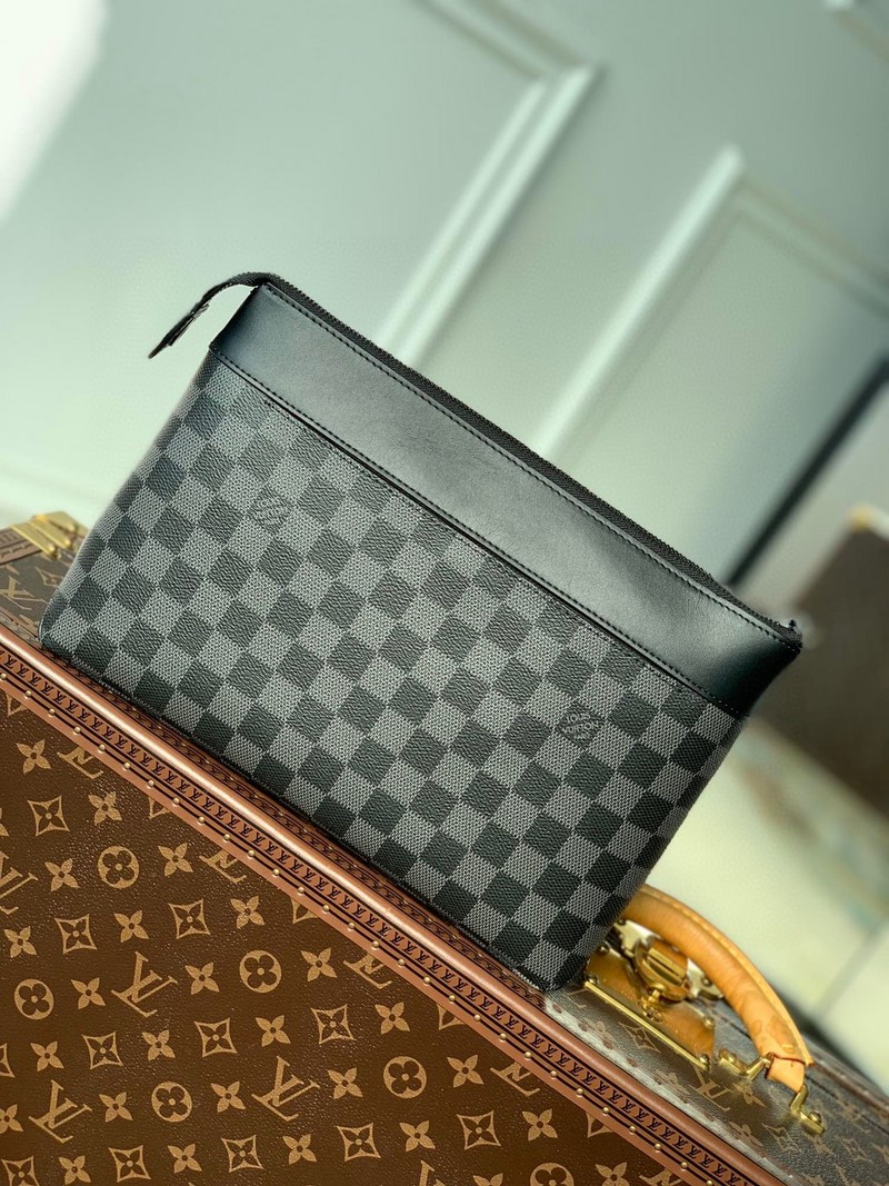 Túi LV Clutches Pochette Voyage Souple Monogram M82800 Caro Đen