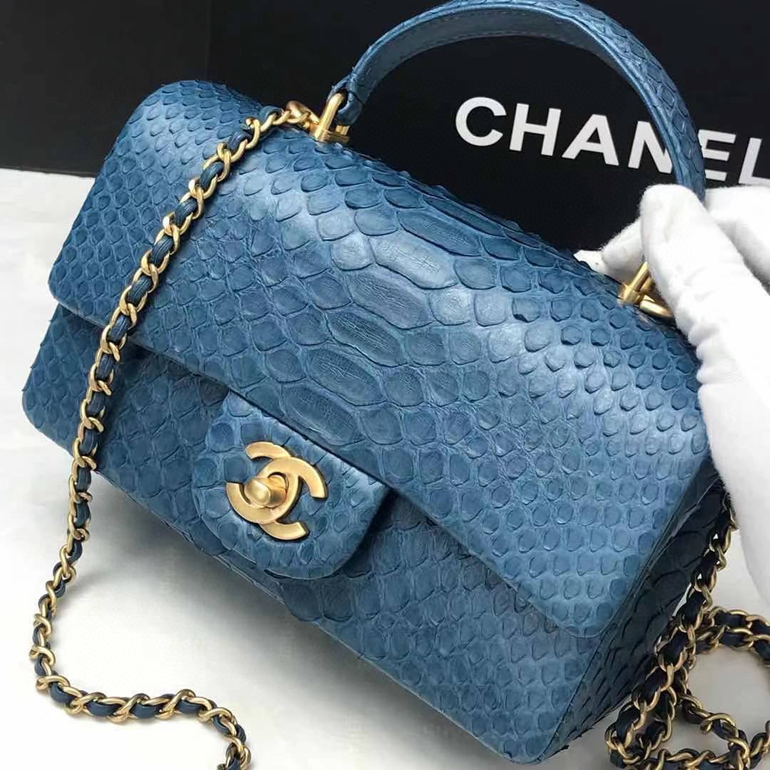 Túi Xách Chanel Classic Siêu Cấp Da Trăn Quai Xách Khóa Vàng Màu Đen Loang Trắng